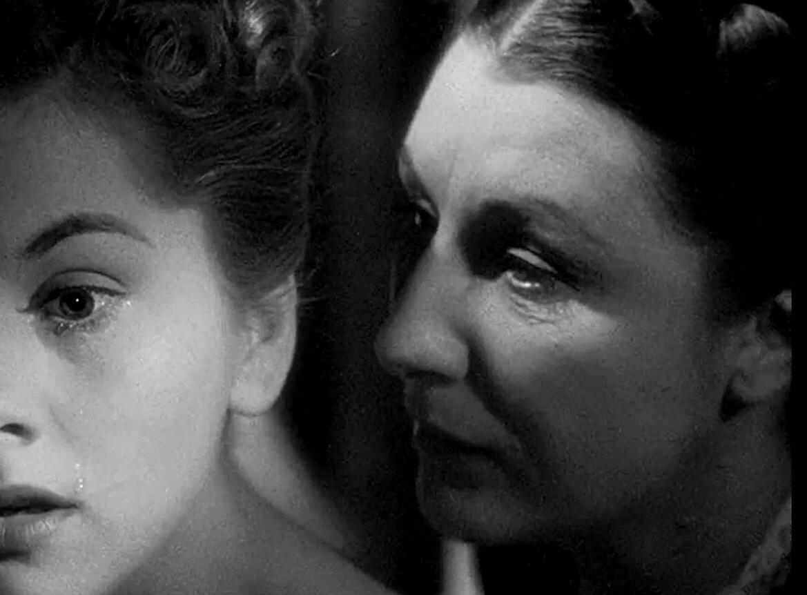 a blurred-out screenshot of mrs danvers, of daphne du maurier's "rebecca"